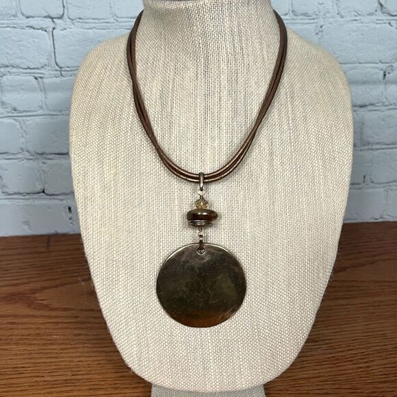 Chico’s Brass hammered pendant w/beaded accent on 17” leather strap & expander - Picture 1 of 7